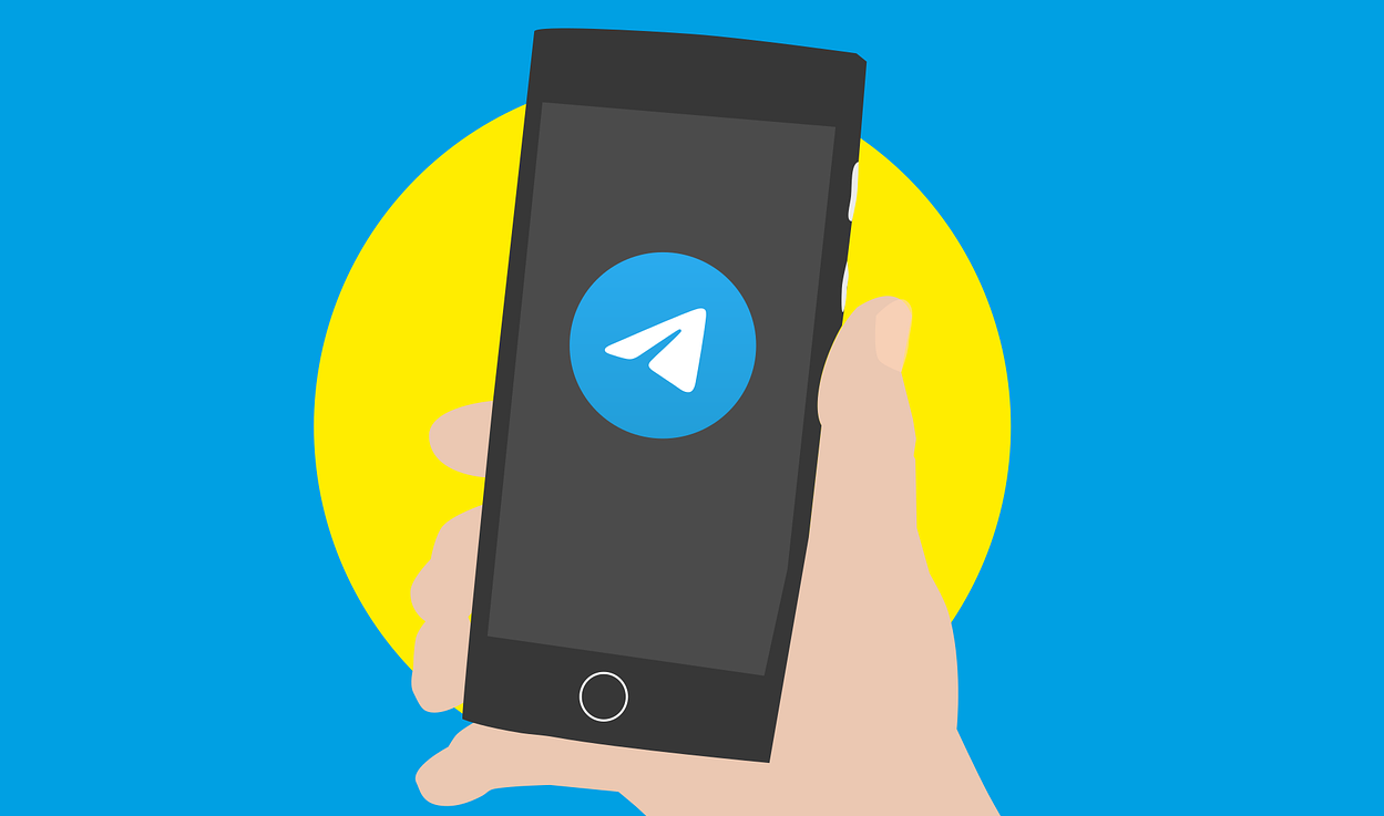 Illustration of person holding an iPhone with the Telegram logo on-screen